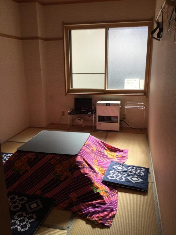 فندق يوزاوافي  أونسن مينشوكو يوتاكايا الغرفة الصورة